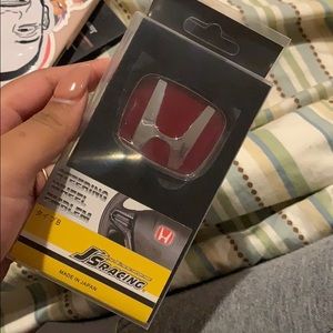 Red honda steering wheel emblem